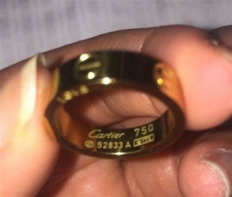 cartier 750 love ring 52833a|cartier 750 ring 52833a real or fake.